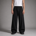 Person wearing black wide-leg pants and a white shirt on a gray background

شخص يرتدي بنطالًا أسود واسع الساق وقميصًا أبيض على خلفية رمادية